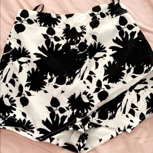 a two piece skirt set with shorts .